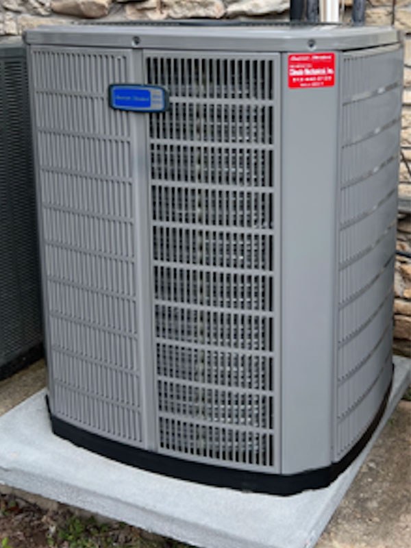 A new American Standard condenser installed by Climate Mechanical on a fresh pad